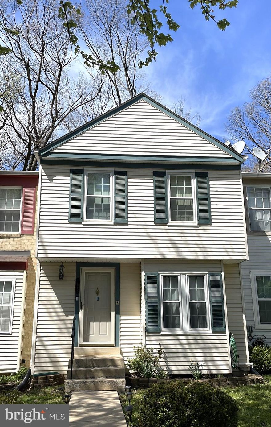 Don't miss out on this lovely gem in the desired tree filled Bonifant Woods.  This 3 level, 3 full bathroom & 2 master suites townhouse is huge w/ 1976 square footage making it one of the larger homes in the community.  Foyer steps down to the very open living & dining room that is very spacious, gleaming hardwood floors & light filled window w/ alcove.  Kitchen has gas stove, wood cabinets, sink w/ window above, spacious eat in kitchen area & walk in pantry.  Sliding glass doors leading to the large deck w/ views of the beautiful trees awaiting your peaceful getaway.  Upper level w/ hall full bathroom, two great sized master suites & one w/ it's own full bathroom & both w/ loads of closet space.  Basement has washer/dryer room, plenty of storage, full bathroom, wood burning fireplace, gracious open basement space & leads to another backyard space paved, grass as well & fully fenced.  Property backs to lavish trees which gives you such a serene setting from the deck, patio & your window views.  One designated parking spaces but two free spots on each side & visitors right across the street.  Very well kept home won't last long.  Great location!