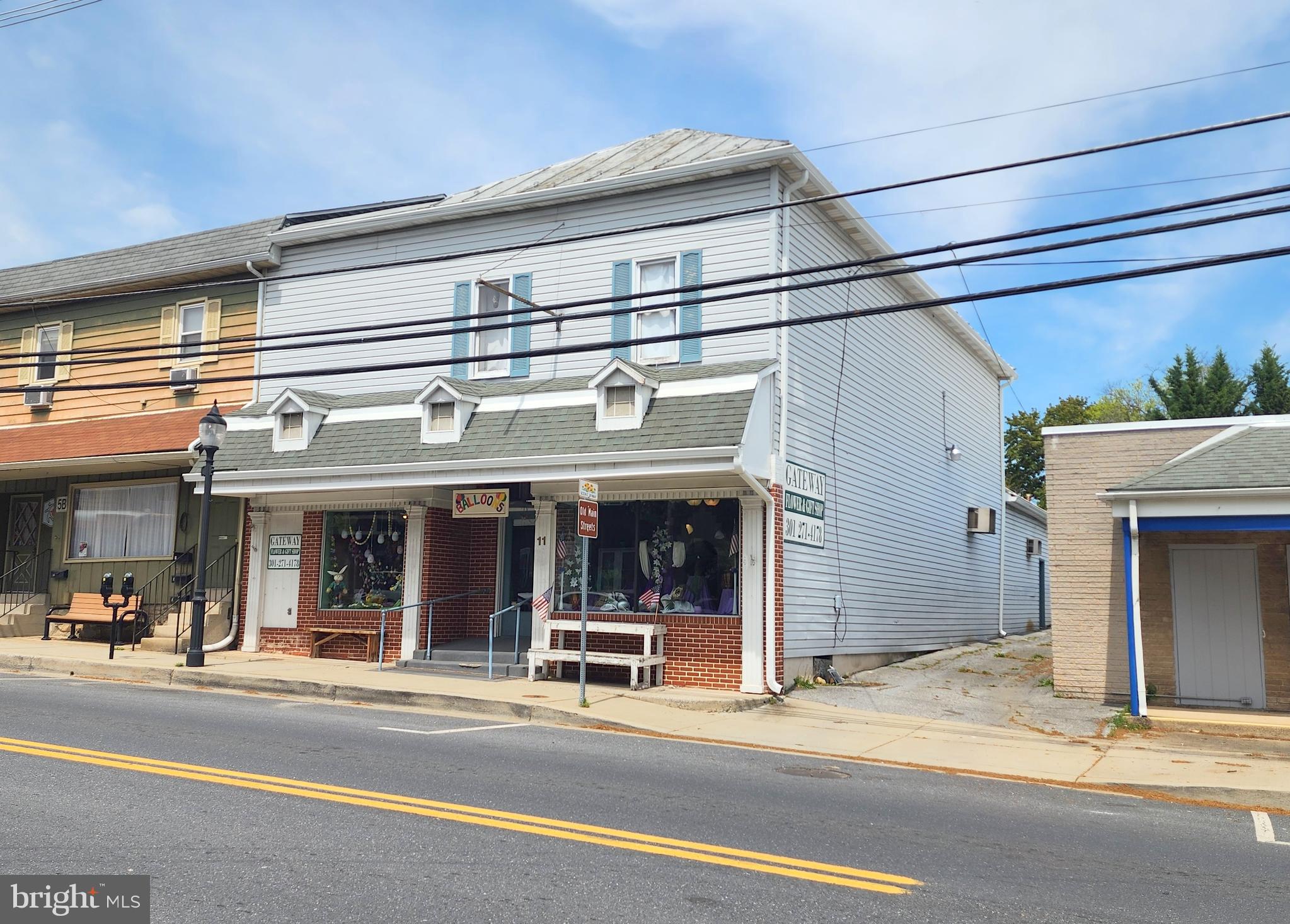 Units 9 & 11 – Now Available for Lease. $15 per square foot per year (combined). Available for the first time in over 40 years! Units 9 and 11 are available individually or together. Unit 9 is approximately 1080+/- square feet and Unit 11 is approximately 2880+/- square feet. This flexible space currently includes a walk-in refrigerator, currently used by a floral shop tenant. Triple net lease, with flexible lease terms. Monthly lease rate based on tenant improvements and space taken. Located in a vibrant area surrounded by business offices, boutiques, restaurants, and more. The building has large dual storefront window units at the first-floor front entrance and double hung units in wood framing on the upper level.
Don’t miss this rare opportunity to lease in a sought-after building with a long-standing history of occupancy and a well-established location.