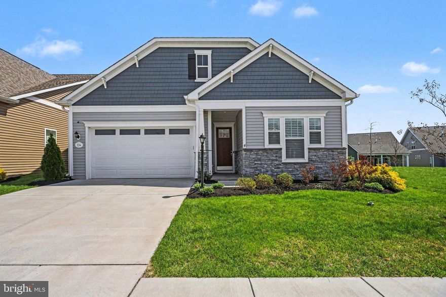 ​The living is easy in this custom home in the highly desirable Amblebrook, a 55+ active adult community in historic Gettysburg. The home is situated on a premium lot in the community with an open space park to one side offering added space, natural light, and fantastic views from the backyard. This 2-bedroom, 2 bath Virtuoso model home by DRB Elevate was just built in 2023 features custom high-end finishes with no detail overlooked and a carefully designed floor plan you are sure to love. The main floor features a bright and open layout with gorgeous luxury vinyl flooring and crown molding throughout, a dream kitchen with white cabinetry and quartz countertops, upgraded appliances, a beverage center with a second sink, pantry, and so much more! The main floor also features a beautiful owner's suite complete with a sitting area, large ensuite bathroom with a custom walk-in shower, and a spacious walk-in closet. A second bedroom and full bathroom, a dedicated office, and laundry room round out the first floor. Upstairs you'll find a versatile flex room for storage or an additional guest room, and a spacious family room. Outdoors features a large screened-in porch and patio perfect for entertaining and relaxing at home. Recent upgrades completed by the homeowners include a security system, plantation shutters, home theater system, custom drop zone cabinetry, a work bench in the garage, professional landscaping, and more! Snow removal, lawn care, and mulch bed maintenance and trimming of front and side beds are all included with the HOA fee. Amblebrook boasts a wide variety of amenities for owners to enjoy including walking trails, indoor and outdoor pools, dog parks, indoor and outdoor sports courts, a clubhouse, craft room, farmer's market, cafe and market, community events and classes, fitness center, yoga room, theater, and so much more! Don't miss all that this home has to offer! Schedule your private tour today!