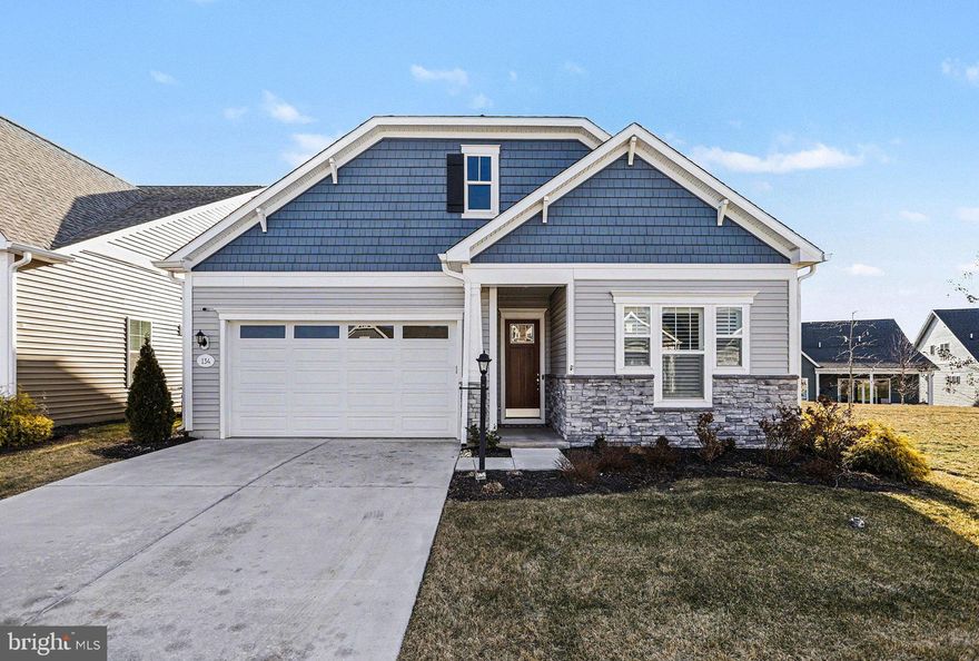 ​The living is easy in this custom home in the highly desirable Amblebrook, a 55+ active adult community in historic Gettysburg. The home is situated on a premium lot in the community with an open space park to one side offering added space, natural light, and fantastic views from the backyard. This 3 bedroom, 2 bath Virtuoso model home by DRB Elevate was just built in 2023 features custom high-end finishes with no detail overlooked and a carefully designed floor plan you are sure to love. The main floor features a bright and open layout with gorgeous luxury vinyl flooring and crown molding throughout, a dream kitchen with white cabinetry and quartz countertops, upgraded appliances, a beverage center with a second sink, pantry, and so much more! The main floor also features a beautiful owner's suite complete with a sitting area, large ensuite bathroom with a custom walk-in shower, and a spacious walk-in closet. A second bedroom and full bathroom, a dedicated office, and laundry room round out the first floor. Upstairs you'll find an additional bedroom and a spacious family room perfect for guests. Outdoors features a large screened-in porch and patio perfect for entertaining and relaxing at home. Recent upgrades completed by the homeowners include a security system, plantation shutters, home theater system, custom drop zone cabinetry, a work bench in the garage, professional landscaping, and more! Snow removal, lawn care, and mulch bed maintenance and trimming of front and side beds are all included with the HOA fee. Amblebrook boasts a wide variety of amenities for owners to enjoy including walking trails, indoor and outdoor pools, dog parks, indoor and outdoor sports courts, a clubhouse, craft room, farmer's market, cafe and market, community events and classes, fitness center, yoga room, theater, and so much more! Don't miss all that this home has to offer! Schedule your private tour today!