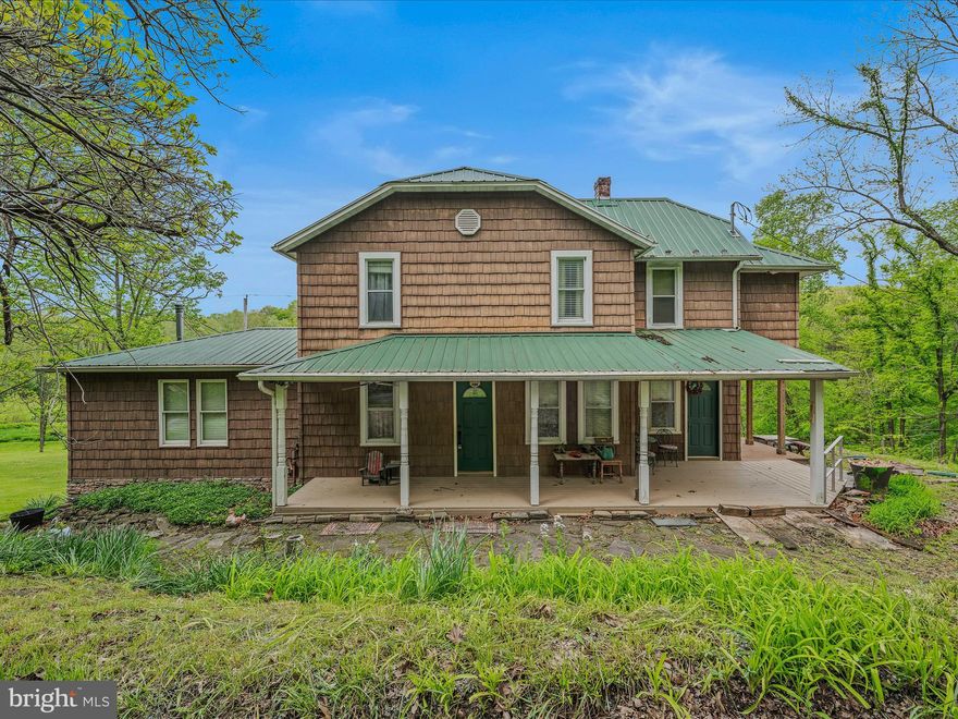 Beautiful setting along the Potomac River.  Live full time  or enjoy as your escape from the hustle and bustle of city life.  Screened porch overlooking the  river.  Mostly furnished, just bring your fishing pole and toothbrush.  Your very own  riverfront parcel  in Almost Heaven WV.