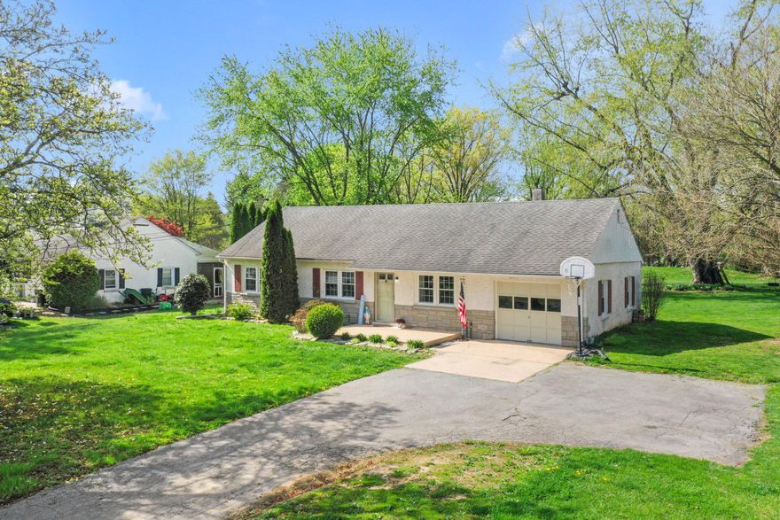 All are Welcome to Tour our Open House Saturday 4/18 from 11-2pm!!!
Step into this charming one‑level ranch, perfectly set on a level ¾‑acre lot with mature landscaping that offers both beauty and privacy. A welcoming front patio and new storm door entry set the tone for the care and attention this home has received.

A spacious driveway with a convenient turnaround provides ample parking for residents and guests. Inside, the original hardwood floors lead you through a naturally bright and comfortable gathering room, down the hall, and into three generous bedrooms—one currently used as a media/office space.

The updated full bath features new flooring, lighting, vanity, and tub surround, giving it a fresh, modern feel. The eat‑in kitchen has been thoughtfully transformed with 42" cabinets for maximum storage, open shelving, abundant counter space, new flooring, added outlets, and recessed lighting—making it a warm and functional hub of the home.

Just off the kitchen, access the oversized workshop/garage, which connects to a clean, full basement housing the home’s mechanicals and laundry. With its impressive size, this lower level offers endless potential for customization.

Out back, a rear patio invites summer BBQs and relaxation, overlooking an expansive yard complete with a firepit and wood storage platform—perfect for cozy evenings with friends and family.

This Horseshoe Pike gem blends comfort, updates, and outdoor enjoyment. It just might be the lucky Gem you’ve been waiting for!