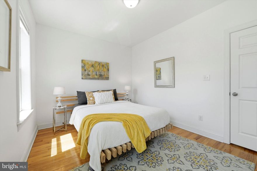 Cute, Cozy & Completely Charming on Latona Street! Welcome to one of East Passyunk's best-kept secrets. This three-bedroom, one-and-a-half-bath row house delivers the perfect blend of classic South Philly character and thoughtful modern updates — all on a quiet, tree-lined block steps from the best the neighborhood has to offer.The main floor flows beautifully with a generously sized gourmet kitchen, hardwood floors, an original wood banister, a convenient half bath, and seamless access to a large private patio — your own outdoor retreat in the heart of the city, perfect for morning coffee or summer entertaining. Upstairs, you'll find large front and rear bedrooms with great light and a flexible middle room that works perfectly as a home office, nursery, or creative space. The full bathroom is a standout — featuring a soaking tub and a skylight that floods the room with natural light. Beneath all the charm is serious substance: excellent bones backed by a recent renovation including fully upgraded plumbing and electrical — the kind of updates that let you move in with total peace of mind. And the location? Simply unbeatable. Nestled between East Passyunk Avenue, Dickinson Square and Queen Village, you're steps one of Philadelphia's most walkable and vibrant dining corridors, home to over 150 independently owned restaurants and shops — including neighborhood favorites like Mish Mish, Barcelona Wine Bar, El Chingon, Irwin's at the Bok Building, and the iconic Pat's and Geno's. Gold Star Park is right around the corner, and a weekly farmer's market at the singing fountain in Passyunk Square! Boutique shopping, indie cafés, and easy access to public transit round out this exceptional package. Homes with this combination of character, updates, outdoor space, and location don't last long. This one is a no-brainer.