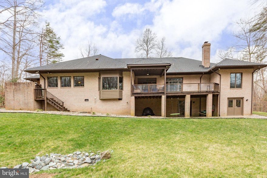 Custom Built All Brick Home Sought After Seven Lakes Neighborhood in Stafford! Almost 5,000 SQFT of Living Space! Major Upgrades already Done for you. Home Offers 3 Spacious Secondary Bedrooms, and a Private Owners Suite on the Main Level which Includes a Private Brick Patio. With the Bright and Open Floor Plan Enjoy the Nature with the Entire Rear of the Home that Showcases the Amazing Extensive Landscaping with Hydro Seeding Done in (2019). The Oversized Partial Covered Deck in the Rear is Perfect for Entertaining or to Enjoy and Relax after a Busy Work Day! New Carpets (2019), Renovated Kitchen (2018) with Granite Counters and Stainless Steel Appliances, Whole House Painted (2018), Two New HVAC Systems Replaced in (2018/2020), New Roof (2015), Exterior Wood Trim Coated in Timber Oil (2020), Garage Ceiling and Drywall Stripped and Resealed. Attached Side 3-Car Garage with a Circular Driveway! This one is a Must See!