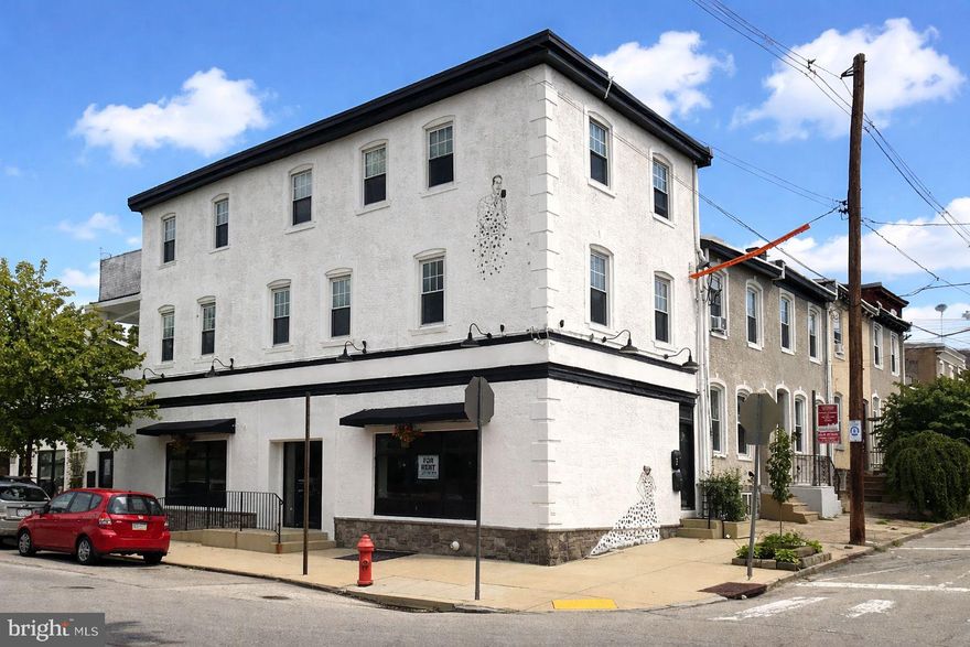 Three-story Mixed-Use Investment Property located on a prominent corner lot in the East Falls neighborhood of Philadelphia, PA.  Ideally located in an up-and-coming and vibrant section of the city right near Thomas Jefferson University.  The property is surrounded by long established landmarks, new retailers and trendy restaurants, and with an attractive mix of students, families and long time residents.  

This 3,769 SF building is zoned as CMX-1, which supports both the neighborhood-serving retail businesses and apartments above.  The ground floor is 1,575 SF of storefront retail space that is currently a beautiful 575 SF salon, and the remaining 1,000 SF was previously a cafe and could be leased to many different types of businesses that would compliment the surrounding area.  The kitchen hood and systems are still in place for a new food & beverage tenant to take advantage of. 

The second and third floor are two (2) three-bedroom / 1-bath apartments that have been updated nicely and feature private balconies and central air.  Most major capital expenditures have been recently upgraded including the mechanicals and utilities.  There is great value-add potential through leasing up the vacant retail space and increasing the apartment rents to marker rate.  This property is an excellent long term investment with many options to create value