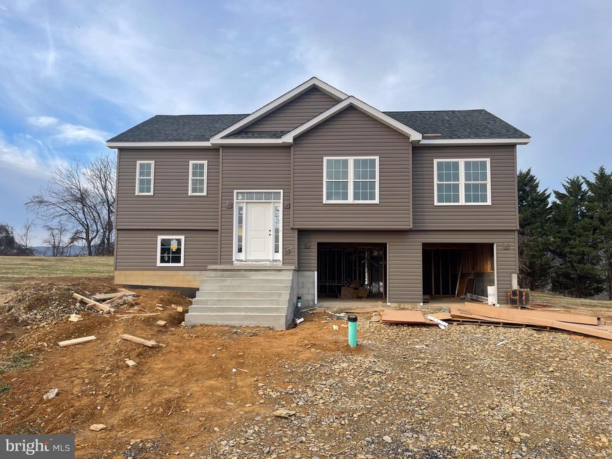 BRAND NEW - 4 BEDROOM 3 FULL BATH SPLIT FOYER.  Amazing layout and big mountain view.  Beautifully appointed kitchen with granite countertops and stainless steel appliances.  LVP flooring throughout and carpet in bedrooms.  Primary bedroom with on suite with double vanity, soaker tub, and shower.  60 DAYS TILL COMPLETION!!!!