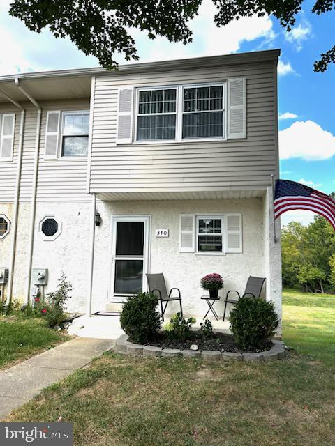 Here's your chance to own a spacious and amazing end unit townhouse in the desirable Beaver Run Knoll Community! This modern 3 bedroom 2 1/2 bath has so much to offer. The cute front porch gives you an additional outdoor space to enjoy what nature has to offer. As you enter the home you'll notice the open floor plan perfect for entertaining family and friends. The updated kitchen has white cabinets including a large pantry and stainless steel appliances. The added bar area overlooking the dining/living room is a plus for further entertaining with it's beautiful pendant lights. You'll also notice the natural sunlight that fills the rooms. One of the added features of being an end unit Townhouse is the extra side windows that the other middle units do not offer. There's a half bathroom on this floor for added convenience. The spacious living room can hold several guests making your house the ideal place to hosts many gatherings. As you head upstairs you will see 2 nice size bedrooms and a large master bedroom with it's beautiful and timeless accent wall. Ample closet space and an en-suite full bathroom completes this wonderful room. There's also a full size bathroom on this floor. Heading downstairs to the basement level you'll notice it's a walk out basement providing additional living space for a family room, a game room, man cave or whatever your heart desires. The low HOA fees and everything that's included makes this community a winner. It's residents gets to enjoy several amenities such as the dog park, a community pool, and tennis courts to name a few. So what are you waiting for come check this place out before it's gone!