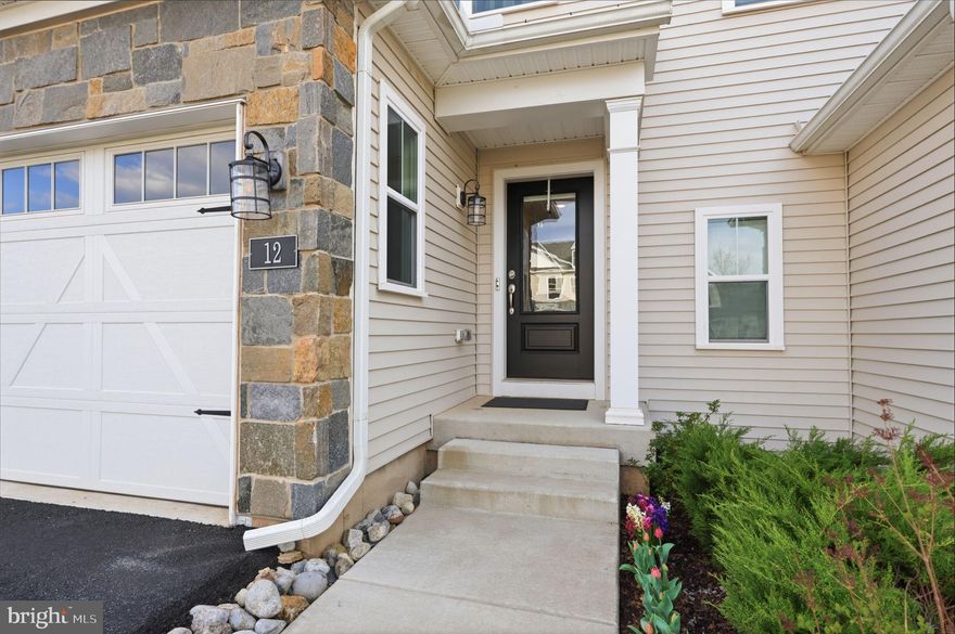Beautiful Beckett model offering 3 bedrooms and 2.5 baths with a bright, open-concept main level and wide plank flooring throughout.  
Living area features a sleek electric fireplace and flows seamlessly to an extended deck, perfect for indoor-outdoor living.
Chef’s kitchen is fully upgraded with 48" white cabinetry and level 3 quartz countertops, 
GE Profile stainless steel appliances, a large center island ideal for gathering, and a built-in microwave and wall oven.
Upstairs offers spacious bedrooms with an efficient layout, upgraded bathrooms, and custom-built closets.
Additional highlights include a basement pre-plumbed for a full bathroom, providing flexibility for future living space, 
Upgraded recessed sprinkler system throught the  house. 
Tesla Universal Wall Connector in the garage.