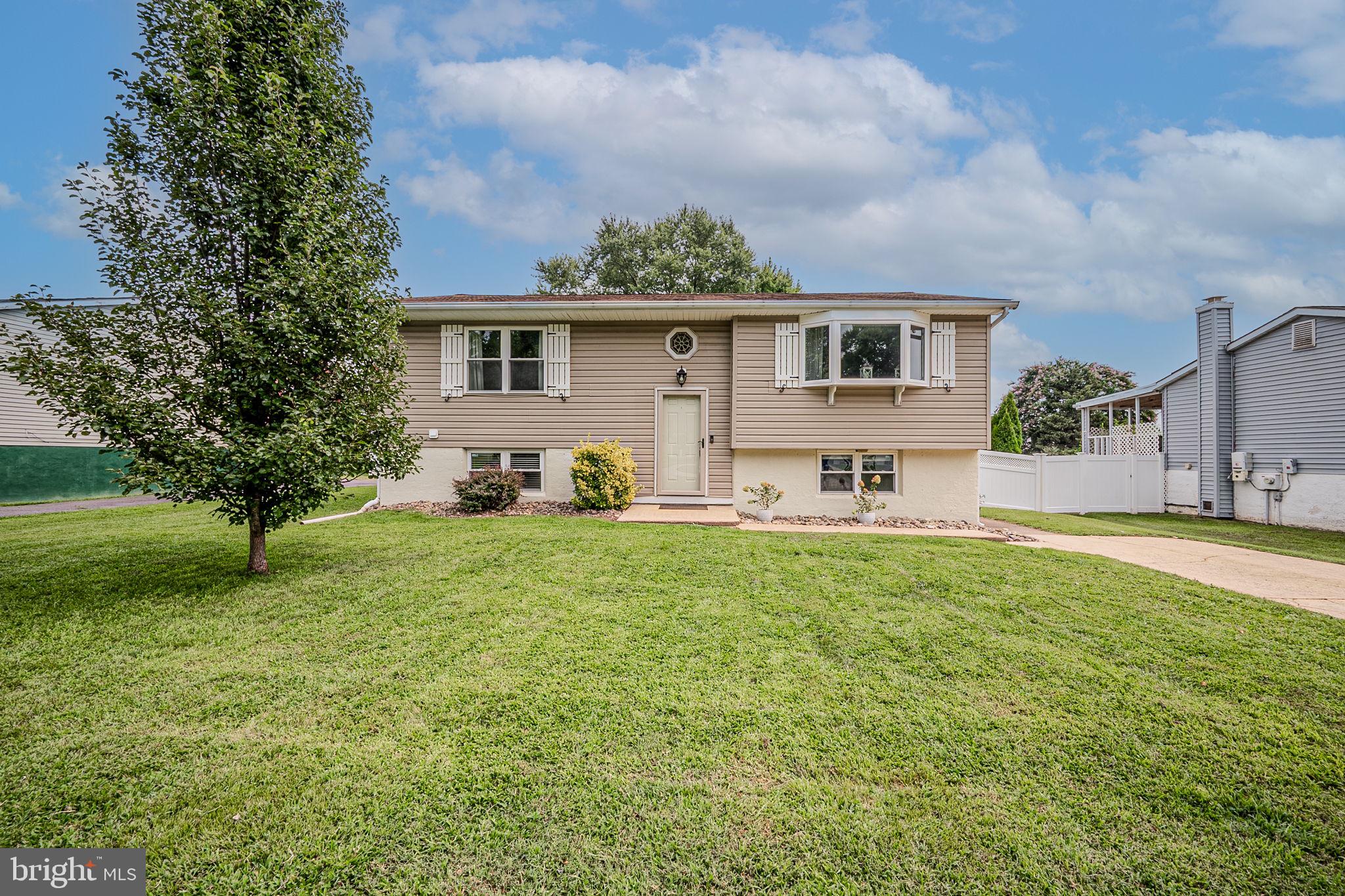 Outstanding 3 bedroom, 1.5 bath bilevel home! Inground Pool oasis, Gourmet kitchen, open Sunroom with Cathedral ceiling and lots of natural light, and a finished lower level with Bar and Fireplace. This home is a Stand out Must See!
Walk into the foyer with steps up to the main level. You are greeted by a living room with a bay window. The kitchen is a chef's paradise - Gourmet kitchen with double oven, Huge island with cooktop, granite countertops, tile backsplash, cabinets galore and open to the sunroom which is large enough for dining with family or enjoying your morning coffee.
Step down to the lower level and you are in the family room with a Fantastic bar area (granite countertop) and warm fireplace, 3rd bedroom, half bath that has plenty of room for adding a shower, laundry room and so many closets for storage complete the lower level.
Pool lovers paradise! Yard has so many great features, off the sunroom is a wrap around deck newly painted overlooking your Pool Lovers Paradise! Steps down to an inviting inground pool, another deck off to the side of the pool for your entertaining area, a gazebo behind the pool and in the corner of the yard a waterfall feature(currently not in use) a beautiful shed with flower boxes complete the backyard. With easy access to the amenities of Elkton and close to Brantwood Park which has disc golf course, fishing, hiking trails and playgrounds. Located just minutes from the DE state line and tax free shopping, Historic Chesapeake City and close to the University of Delaware. Get to 95 and Route 40 within minutes, making easy access to Baltimore, DC, or Wilmington and Philadelphia. This home combines comfort with convenience. Don't miss the opportunity to make 126 Midland Dr your new home, and schedule your tour today! Welcome Home!