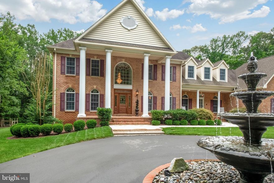 PRIVATE SANCTUARY--TRULY ONE-OF-A-KIND!! GATED ENTRANCE--CIRCULAR DRIVEWAY--CUSTOM OUTDOOR AREA INCLUDES POOL, WATERFALL, BUILT IN FIRE BOWLS, WATER SLIDE, FIRE PIT, PERGOLA, HOT TUB, FISH POND, AND OUTDOOR KITCHEN, POOL HOUSE AND EXTERIOR TV'S--LOWER LEVEL BOASTS THEATER ROOM, IN-HOME GYM ROOM, CUSTOM BAR, FIREPLACE--CAR COLLECTOR'S DREAM--3-CAR ATTACHED--2-CAR DETACHED--SEE THIS PERFECT "10"