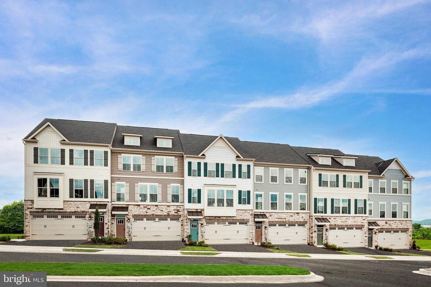 --To Be Built-- McPherson 4 Story at Harrington Terrace. This modern town home has all the luxuries you want and need. You have to come to the model to see how open, airy and spacious this 24 foot wide townhome with 9 foot ceilings on every level truly is! This home is situated on a walk out lot so you will get tons of natural light throughout the lower level and the entire home. The McPherson comes complete with a true to size 2-car garage and rear yard- a rare find for townhomes in Frederick County. A spacious fully finished recreation room perfect for entertaining is included with your base cost and you can add a lower level full bathroom with walk in shower as an option so the home will have a total of 4 baths! The main level of this home is incredible. It truly is the heart of the home. It features a gourmet kitchen with upgraded cabinetry, granite countertops and an expansive kitchen island you wont want to miss- included. Or you can customize your home and choose to upgrade to quartz countertops in the kitchen and bathroom. Add the 4 foot extension option and you will enjoy the pocket office, tons of extra cabinetry and can add a double wall oven and cook top. Stainless steel appliances, an outside venting microwave and pendant lighting are included with the base price of the home. Just off of the kitchen is the huge great room with a large half bath in the perfect location- tucked away from guests in the great room and far away from the kitchen! The dining area is spacious and airy and leads to your optional deck on the rear of your home. Upstairs, the 2 secondary bedrooms are the largest you will find in a townhome and both feature 8 foot closets. The primary bedroom is gorgeous with the walk in closet of your dreams and a spa-like primary ensuite that features a double bowl vanity and the oversized dual headed Roman Shower- included! You will love the McPherson!! It offers the perfect mix of luxurious, yet low maintenance living with the square footage of single family homes.  Other floor plans and home sites available.
Photos are representative.

You'll love the convenience of Harrington Terrace.  Located right off Rt. 340, you'll be minutes to everything you need! 5 minutes to Downtown Frederick.  There's always something to do with hundreds of shops, restaurants, live entertainment at Carroll Creek, farmer's markets, Baker Park and more!
