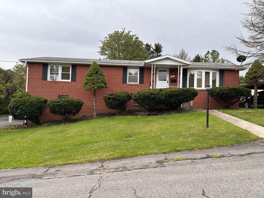 IF THIS HOUSE COULD TALK…IT WOULD SAY, “I’M JUST WHAT YOU’VE BEEN LOOKING FOR, WORTH SEEING, WORTH OWNING!!  3 BEDROOM, 2 BATH TOTAL BRICK RAISED RANCHER ON 0.2 ACRE LOT. EXTERIOR FEATURES BRICK ON ALL SIDES, DBL HUNG WINDOWS, METAL FRONT DOOR, STORM DOOR,  (25 YR) SHINGLE ROOF, PAVED DRIVEWAY, 1-CAR GARAGE W INSULATED DOOR, EXTERIOR DOOR TO BSMT, SMALL COVERED PORCH W/RAILING, REAR CONCRETE PATIO, LARGE REAR YARD PARTIALLY FENCED &  LANDSCAPPED LOT.  INTERIOR INCLUDES: LARGE LIVING ROOM W/LAMINATED H-W FLRS, WINDOW AC UNIT. KITCHEN W ALL APPLCS, ABUNDANT CABINETS, CERAMIC TILE BACK SPLASH, WOOD CASE WINDOW & LAM. H-W FLOORS.  SEPARATE DINING ROOM OFFERS CEILING FAN/LIGHT,  SLIDING GLASS DOOR LEADING TO PATIO & LAM. H-WD FLRS.  3 BEDROOMS INCLUDE ORIGINAL OAK HARDWOOD FLOORS, CEILING FAN/LIGHTS, WOOD PANEL WALLS, CUSTOM BLINDS AND DEEP CLOSETS.  2 (NEWLY  REMODELED) FULL BATHS W NEW MIRRORS, TOILETS, SINK & DBL VANITY & CERAMILE TILE FLOORING.  WOODEN STAIRS W CARPET LEAD TO FULL UNFINISHED BASEMENT CONTAINS LAUNDRY ROOM (WASHER & DRYER  NOT INCLUDED),  ½ FINISHED MUD ROOM S WOOD PANEL WALLS &  CONCRETE FLOORS. L-SHAPED UNFINISHED DRIVE-IN/BASEMENT GARAGE W STORAGE AREA, BUILT-IN SHELVES & CONC. FLRS.   OTHER AMENITIES: SEPARATE ZONE HEAT, 200 AMP SERV, FULLY INSULATED CEILING IN BSMT & MORE.