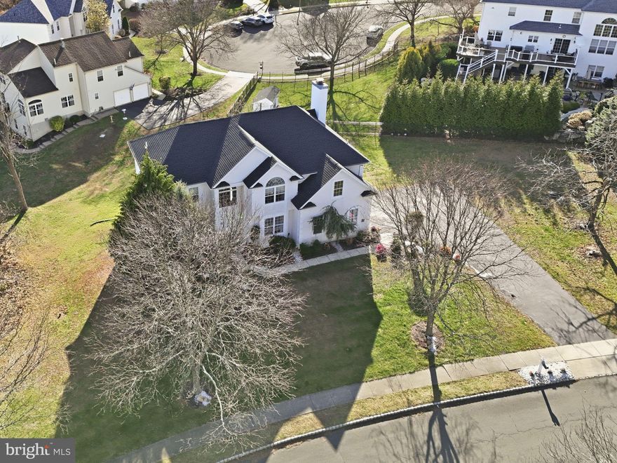 *** OPEN HOUSE Sunday, December 7th 10:00 AM - 12:00 PM *** Large 4 bedroom 2.5 bath, 3,498 sq ft single home on a large premier 1.01 acre scenic lot in Chalfont's desirable Hickory Ridge neighborhood.  Walk into 2 story foyer.  Formal living room and formal dining room on left.  Home office / study on right.  Off back of home contains large kitchen with glass sliding doors leading to rear deck and also large spacious two story family room off kitchen with open concept layout perfect for entertaining.  Family room also contains plenty of windows which offer plenty of natural light, rear back staircase and elegant slate fireplace as centerpiece of room.  First floor also contains a powder room and access to attached 2-car garage.  Upstairs contains 4 spacious bedrooms and 2 full bathrooms including the primary suite with vaulted tray ceilings, walk-in closet and its own large bathroom with soaking tub, tile shower and double vanity.  Upstairs also includes a conveniently located laundry and also a large attic space which could be converted into a walk in closet, office or 5th bedroom.  Large partially finished basement with walk out entry which extends under the entire perimeter of home's living space.  Property has endless possibilities including possibilities to add a wrap around deck off the back left side of house which would give Pocono like vibes overlooking the woods and backing to creek.  Yard also has plenty of room to add an in ground swimming pool on one of the largest and most private lots in Hickory Ridge.  Property also contains a private paved driveway which offers plenty of off street parking.  NEW ROOF - September 2025.  Home includes a transferrable home warranty in place with current homeowners as well.  *** Award Winning Central Bucks School District ***  Direct access to Scenic 202 Walking & Biking Trail.   Properties like these do not become available often.  Don't let this one slip by.
