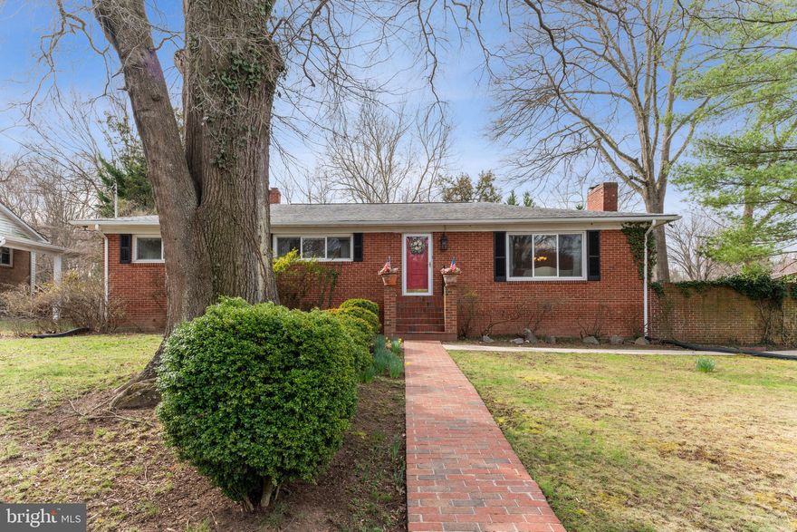Buyer financing fell through so ANOTHER CHANCE FOR YOU!! Beautifully sited on a half-acre lot overlooking trees with a fully fenced and expansive backyard, this classic four bedroom, 2 bath all brick rambler with peek-a-boo views of Broad Creek Bay is in excellent condition and brilliantly located with easy access to National Harbor and its restaurants, shops and entertainment,  and everything Old Town Alexandria and Capitol Hill/Washington, DC. has to offer. The elegant brick front walkway ushers you into the home and it's formal foyer, where  newly refinished hardwood floors in all living and sleeping areas enhance the the home's spacious floor plan and its living room with built-ins, separate dining area, table space kitchen with granite countertops and upgraded cabinets and four spacious bedrooms and two baths, including a primary suite with an attached full bath. Windows on the lower level provide great natural light to a finished family/rec/playroom, and a pristine storage area with a washer and dryer. The backyard is easily accessed from either level of the home, and the generous green space and patio are perfect for relaxed living , fun and entertainment while an attached carport provides convenience and protection from the elements. A real gem in Fort Washington!