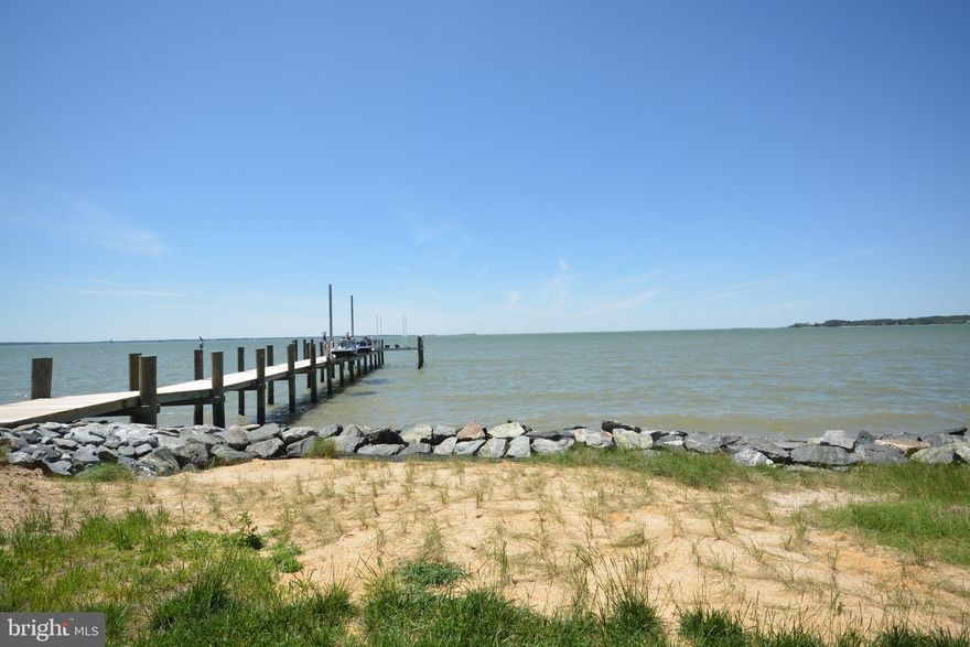 Your Custom Dream Waterfront Home Awaits!  This rare, build-ready lot offers a blank canvas for you to craft your perfect Eastern Shore estate with spectacular, panoramic views! The 2.9 acre waterfront lot in the Bachelor Pt section of Oxford offers 180 degree panoramic views stretching across the majestic Choptank River. Enjoy the peace of mind of a recently installed rip-rap shoreline over an estimated 569 feet of protected waterfront, providing long-term erosion protection and maintaining your valuable waterfront.  The property also includes a new dock setup, featuring a heavy-duty 16,000 lb boat lift and two additional lifts perfect for jet skis. The lot is located within Oxford town limits, offering the advantage of access to public water and sewer hook-ups.  Final approval has been given from the Oxford Planning Board for the building plans the current owner proposed providing a massive head start on your construction timeline. Those plans can be included in the sale of the lot and while you may modify them to suit your taste, having approved plans means the property is truly "build-ready."  Simply choose your builder and start constructing your dream!
