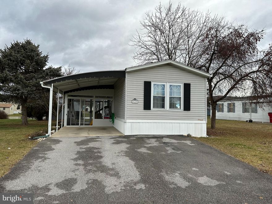 Welcome home to 319 Cameo Dr in Colonial Estates. Featuring 2 beds 2 baths and a beautiful glass porch for all your plants.  This home has been well maintained.   Lot rent is $505 per month that includes sewer & trash. New owner will need to be approved by park owner.