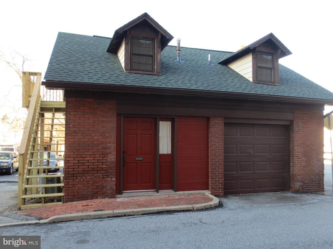 Utterly charming detached carriage house in the heart of the city, just a 1/2 block from main library at Market and N. Queen Sts. Completely remodeled, new everything, would be great work/live space. One bedroom and bath up spiral steps to second floor. Main level laminate hardwood, new kitchen, living room and family room. Parking space available. Need minimum of 48 hour notice to show.
