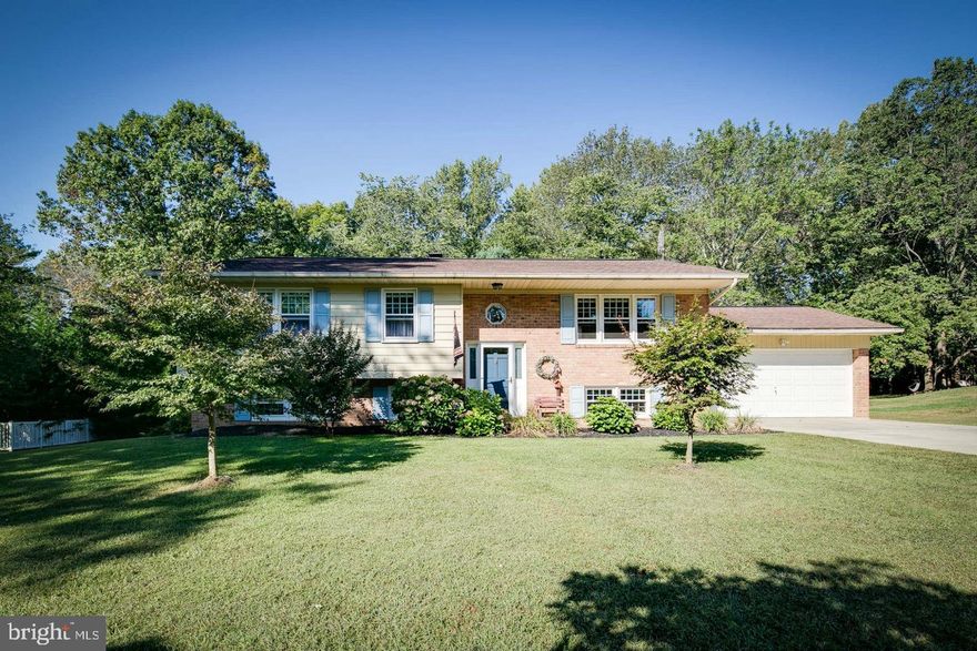 Fallston Split,  on large lot,  Florida room with grilling deck and patio. garage, Great Kitchen, lower level with Fireplace and walk out.