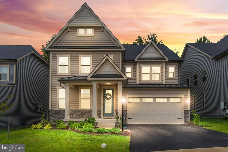 Built in late 2022, this  luxury “Tyler” model from NV Homes features an open floor plan with almost 4,500 finished sq. ft. Walk into your spacious foyer with wide plank LVP flooring throughout the entire first floor. To your left you have french doors to your private office. Walking down the hall you have a spacious formal dining room. Your living room has additional windows to add natural light & modern fireplace & opens to your kitchen. Upscale kitchen with two tone custom cabinets with crown molding, quartz countertops, gas cooktop with stainless range, double oven, built in microwave, ceramic tile backsplash, farmhouse sink & island with barstool seating.  Informal dining area off kitchen. Huge walk-in pantry. Mud room with custom built- ins for coats and shoes. Upstairs you have a huge bonus sitting area at the top of the stairs. Owners bedroom suite with tray ceilings & two huge walk-in closets. Luxury owner's bathroom suite with custom ceramic tile, sit-in tub for two, separate shower, two vanity's & private toilet. Guest suite with private bathroom. Bedrooms 2 & 3 share a "Jack & Jill" bathroom. Lower level finished with a spacious family room area, window with egress and full bathroom. This smart home has hot spot extenders on each level to maximize your internet service & smart thermostats. Tankless hot water heater & two zone heating and cooling. Convenient second floor laundry room with large capacity washer and dryer. Located towards the end of a cul de sac. Community has multiple swimming pools, beach and lake access, over 35 miles of hiking and biking trails, basketball, volleyball, tennis courts, community centers, sidewalks & playgrounds/tot lots including one located on our street. Community events include weekly food truck nights, farmers markets, concerts & community monthly events. Award winning Oakdale schools that are in walking distance You are not only renting a home you are becoming part of a community. .