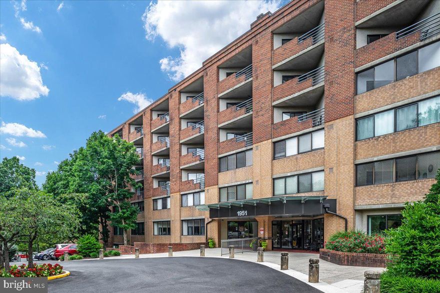 Welcome to Thoreau Place, where comfort meets convenience in this much sought after 55+ community! This one bedroom one bath unit boasts new luxury vinyl plank flooring (2024) and paint (2024).  A corner unit backing to trees, you will enjoy views of nature year round.  The sunroom at the back of the unit is the perfect spot for plants or for a cozy book corner.  This unit has been thoughtfully remodeled to open the kitchen up to the main living area, making it feel large and spacious.  Enjoy a convenient washer and dryer in the unit and an additional storage area in the basement (parking garage level).  

Thoreau Place couldn’t be in a better location, less than a mile from the Wiehle metro, 3 miles to the Reston Town center, and 6 miles to Dulles Airport, Residents here rave about the pedestrian underpass trail that leads to South Lakes Shopping Center which includes Safeway, CVS, Starbucks, Red’s Table, Cafesano, and more!  Further, you’re less than a mile from Lake Thoreau, Lake Audubon, and the Lake Audobon pool.  

The community amenities are impressive, with multiple terraces for social events (4th, 5th, and 6th floors, an event center for receptions and parties with a full service kitchen (1st floor), a library, coin-op laundry, and gym/exercise room.  Dogs under 45 pounds and cats are permitted but no birds.  The building has been well maintained with the Courtyard Decks rebuilt in 2020, roof replaced in 2023, elevator mechanicals replaced in 2022, and the parking lot repaved in 2023.  At least one full time resident must be 55 years old or better, an additional resident may be under 55.