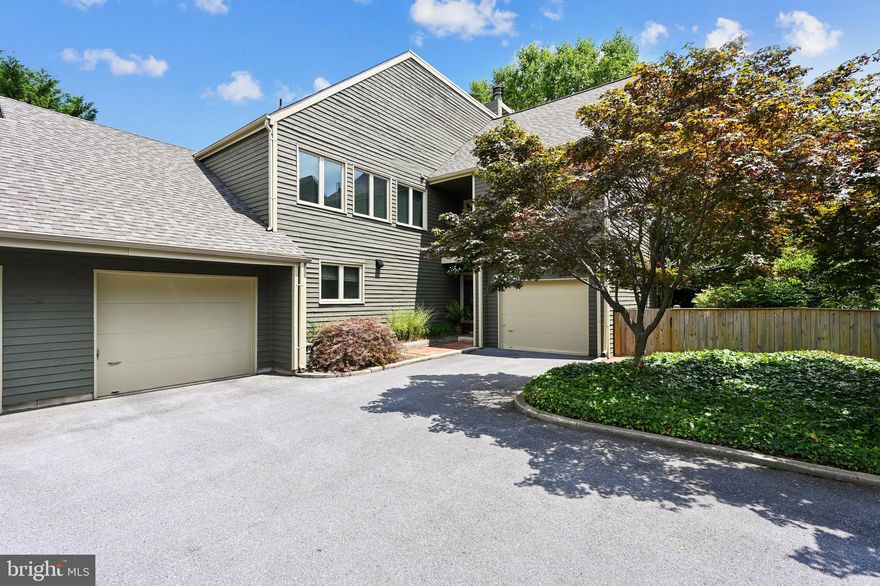 Sophisticated, contemporary townhouse located in the heart of  the historic Eastport peninsula. This spacious 3/4 bedroom home is situated in a secluded enclave of four homes, and has two separate garages, and extensive patio and deck areas-perfect for entertaining.  Enjoy an open floor plan with appealing architectural elements.  The beautifully updated chef's kitchen has granite counter tops, stainless steel appliances, marble floors and wood cabinetry.  The kitchen opens to a living area with hardwood floors, wood burning fireplace and doors to multiple outdoor entertainment areas.  The master suite enjoys abundant natural light, a remodeled bathroom with skylight and an attached "bonus" room, which is perfect for a home office or reading retreat and an additional large storage area.  The second master also has a beautifully updated bathroom with dual vanity. There is a cozy den with a wall of book shelves for "in home" entertainment and a sunny loft room with a very large storage area.   There are numerous upgrades including  high efficiency Bosch HVAC in 2019 and a new roof in 2018.  Most of the doors and windows were replaced in recent years.  What an opportunity to be in the heart of Eastport within walking distance to the water and maritime adventures and to some of the finest restaurants that Annapolis has to offer.  This home is turnkey for ease of living!