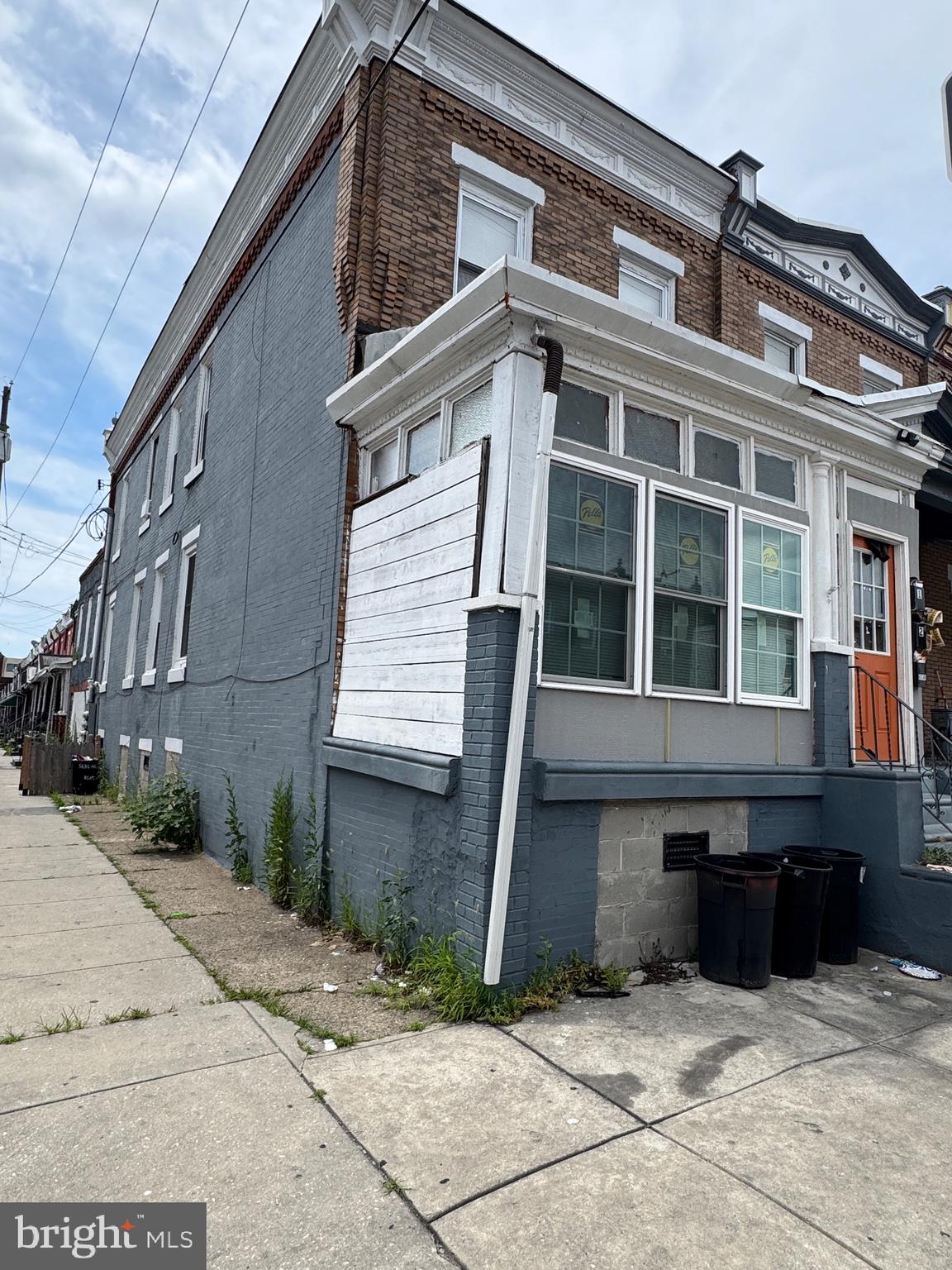 INVESTOR ALERT! This nearly 2,500 square foot property located in the heart of West Philly has a RARE attached two car garage. This triplex features one 3 bedroom 1 bath unit, one 2 bedroom 1 bath unit, and one studio is located just 2 blocks from the Market-Frankford Line. With a little bit of TLC, this property has a ton of income-producing potential It was last used as a Multi-Unit (not zoned); however, electric has been separated.