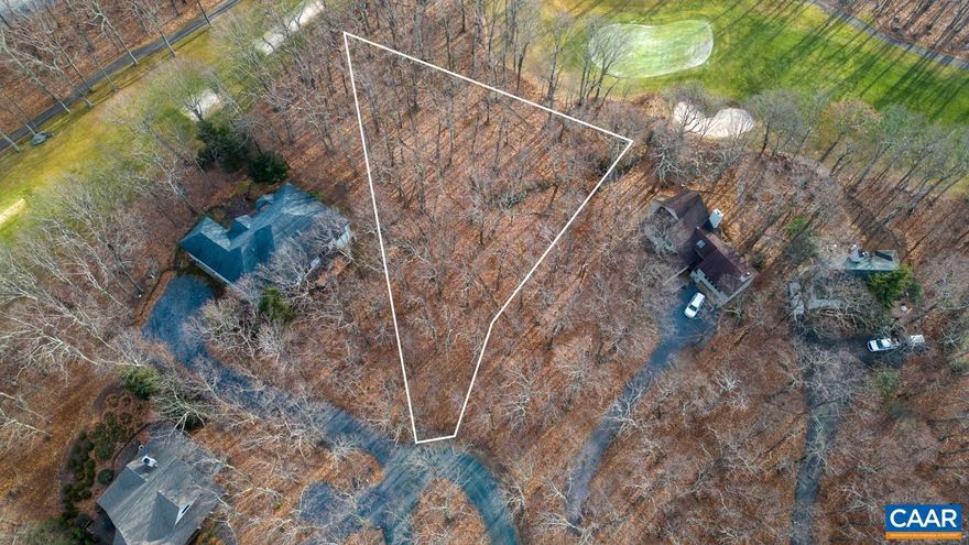 UNBEATABLE DEAL ON A PRIME HOMESITE! Embrace the ultimate golf lifestyle with a prime homesite nestled between the 9th green and 1st tee of Devils Knob Golf Course. Surrounded by tranquil woods and mere steps from Devils Grill, golf, tennis, and pickleball. An elevated site on a private cul de sac, with clearly marked boundaries for easy viewing and planning. Don't miss this! It's time to start designing your Wintergreen dream home!,Deer Springs 111