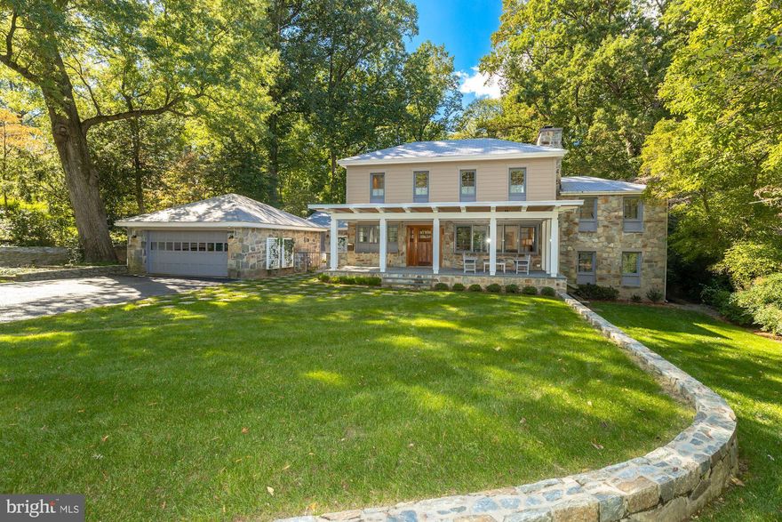 One light to DC! Featuring a quiet cul-de-sac location and beautiful park-like setting on over half of an acre, this thoughtfully renovated and expanded home offers a light-filled and versatile floor plan that includes two main level home offices. The living room provides a gas fireplace and leads to the library and striking dining room with a gas fireplace and floor-to-ceiling windows overlooking the verdant backyard. The gourmet kitchen, featuring two-story ceilings, a large island, granite counters and high-end appliances, opens to the family room that provides access to the backyard patio. The two main level offices, one with an en suite bath, are ideal for working from home and virtual learning. Upstairs, there is an elegant owner's suite with an expansive dressing room with an island and an en suite bath with dual vanities, a seamless glass shower, a freestanding tub and lots of closet space. Five additional en suite bedrooms and a recreation room complete this one-of-a-kind offering. The fully-fenced backyard features beautiful and expansive upper and lower patios with stone pavers, a manicured lawn with plenty of room for a pool and mature evergreens that provide year-round privacy.