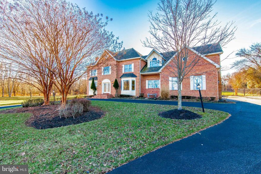 Your dream home! Nestled in Woodmore's esteemed gated golf community. Enjoy gorgeously landscaped views, in the company of unique luxury homes that complement yours. THIS MUST SEE, extravagant 4 bdrm; 5.5 bth; 3 lvl estate, spanning over 4900 SF. Provides generous living space and stylish finishes; beautifully positioned on 2.5 acres w/ Backyard perfect for relaxing or entertaining!Stop in today