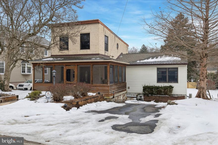 Nestled on an exceptional lot in the heart of Lafayette Hill, this charming 3-bedroom, 2 full bath single-family home offers space, character, and unbeatable convenience. A welcoming front screened-in wraparound porch sets the tone, leading into a bright, open-concept living and dining “great room” filled with natural light and highlighted by a beautiful oak staircase and railings. The oak cabinet kitchen is both functional and inviting, featuring a 5-burner gas stove, stainless steel refrigerator, pantry cabinetry, ceramic tile flooring and backsplash, and a breakfast bar.  The kitchen flows seamlessly into the family room which showcases vaulted knotty pine ceilings and wainscoting, with direct access to a multi-level deck complete with built-in benches—perfect for entertaining or relaxing outdoors. The main level also includes a spacious primary bedroom with its own ductless A/C system, a large walk-in closet, and a ceramic tile full bath with decorative inlays, granite vanity, and a walk-in whirlpool tub with shower. A convenient laundry room with utility sink and ample cabinetry completes the first floor. Upstairs, you’ll find two generously sized bedrooms with excellent closet space and a ceramic tile hall bath featuring a jetted tub/shower combo plus a linen closet. The unfinished basement offers abundant storage and includes a walk-out to the rear yard. Additional highlights include two-zone heating, solid wood doors throughout, a private driveway accommodating at least two cars, ​one large finished shed outbuilding with electric which is perfect for a home office or exercise room PLUS a 2nd huge storage shed. The walkability from this property is amazing! Ideally located within walking distance to Whitemarsh Elementary School, William Jeanes Memorial Library, Miles Park, and Plymouth Whitemarsh High School, and just minutes to Chestnut Hill, King of Prussia Mall, Conshohocken, Manayunk and major routes including I-76, I-476, and the PA Turnpike, this home offers an easy commute to Philadelphia International Airport and beyond.  A rare opportunity to own a beautifully maintained home in one of the area’s most desirable locations.