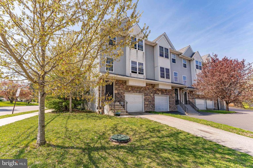 Welcome to 752 Cedar Lane, a 3-bedroom, 2.5-bath end-unit townhouse in the Cedar Commons community of Norristown. As you approach, a two-car driveway and one-car garage provide convenient parking. Inside, a split foyer leads to both the main living level and the lower level. Upstairs, the kitchen features tile flooring, granite countertops, a peninsula with seating, stainless steel GE appliances. The kitchen flows into the dining area, which offers luxury vinyl plank flooring and a chandelier. A powder room with tile flooring is conveniently located just off the dining space. The dining area opens to the family room, where luxury vinyl plank flooring, two bright windows, and a ceiling light create a comfortable and inviting living space. On the second level, the primary bedroom features carpet flooring, a ceiling fan with light, and a walk-in closet. The en-suite bathroom includes tile flooring, a tiled step-in shower, and a single sink vanity. Two additional bedrooms, both with carpet flooring, offer flexible space for family, guests, or a home office. A full hall bathroom with tile flooring and a tub and shower combination, along with a conveniently located laundry room with washer and dryer, completes this level. The lower level adds additional living space with a finished family room featuring beautiful carpet flooring and direct access to the backyard. This level also includes a utility room with a newer HVAC system (2024) and interior access to the garage, which offers additional storage. Conveniently located near McCann Park, as well as local shopping, grocery stores, restaurants, and more, this home also provides easy access to the Pennsylvania Turnpike for commuting and travel. Don’t miss the opportunity to make 752 Cedar Lane your new home.