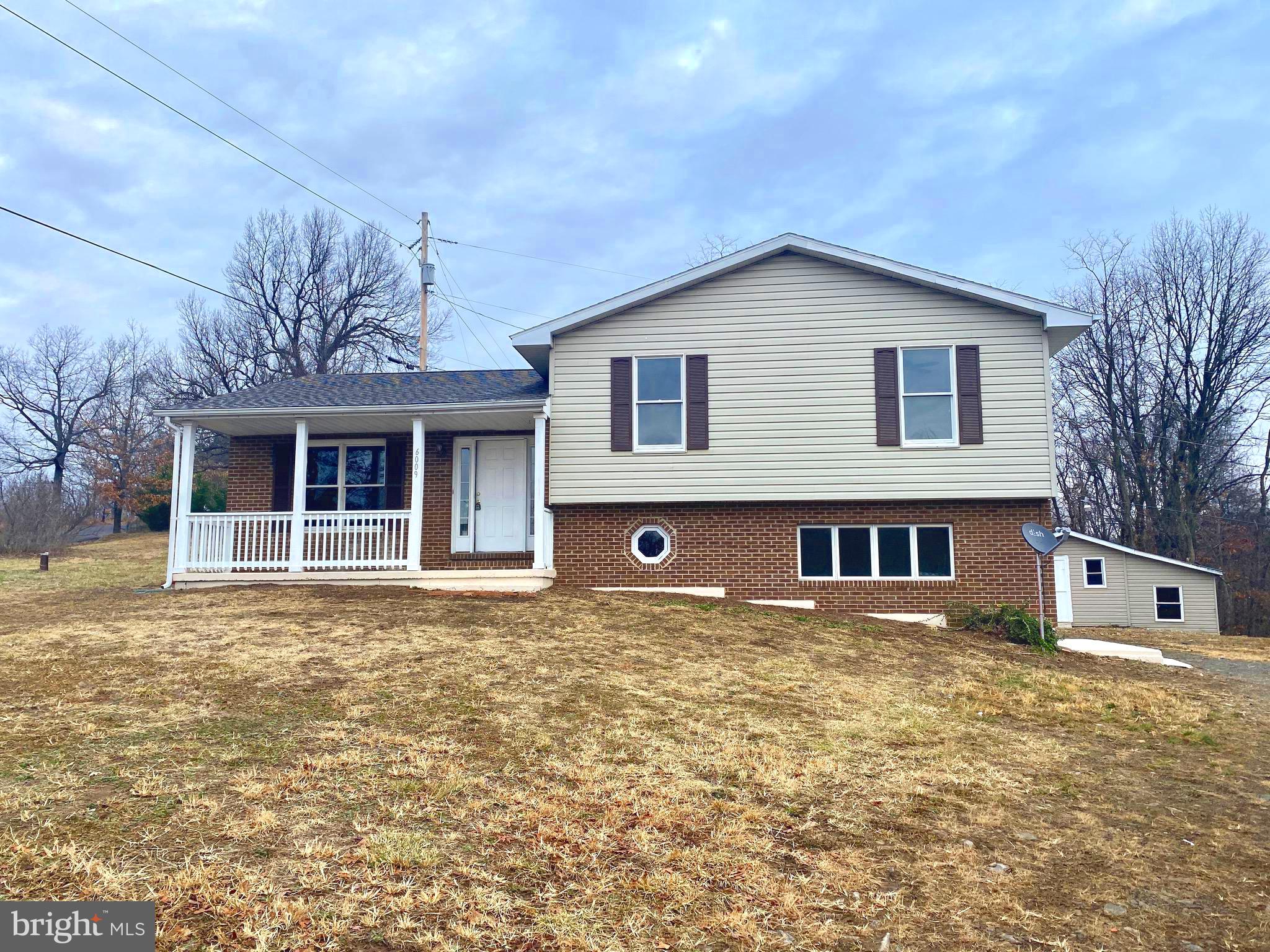**DEADLINE FOR OFFERS MON. 1/13, 5pm. MULTIPLE OFFERS IN HAND. SUBMIT HIGHEST AND BEST ** This 4 bedroom, 2 bathroom home features 3 levels of living and sits on a 2.95ac lot. This home has been newly renovated and is ready to move-in! You'll love the main level open floor plan! The kitchen has a large granite-topped center island with granite counters and a beautiful tiled backsplash. It's outfitted with stainless steel appliances, new LVP flooring, and plenty of room for a dining area. It opens to a large living room on the front of the home with brand new wall to wall carpeting. French doors open to your large wooden deck, perfect for your BBQ grill and outdoor furniture. Upstairs you'll find 3 bedrooms and a full bath. On the lower level you'll find a 4th bedroom, a recreation room, laundry room and full bath. The home has new paint and flooring throughout! There is a quaint front porch for a sitting area. Out back you'll find a large shed to store your lawn equipment, etc. The driveway has fresh gravel. Plenty of room in which to grow here!