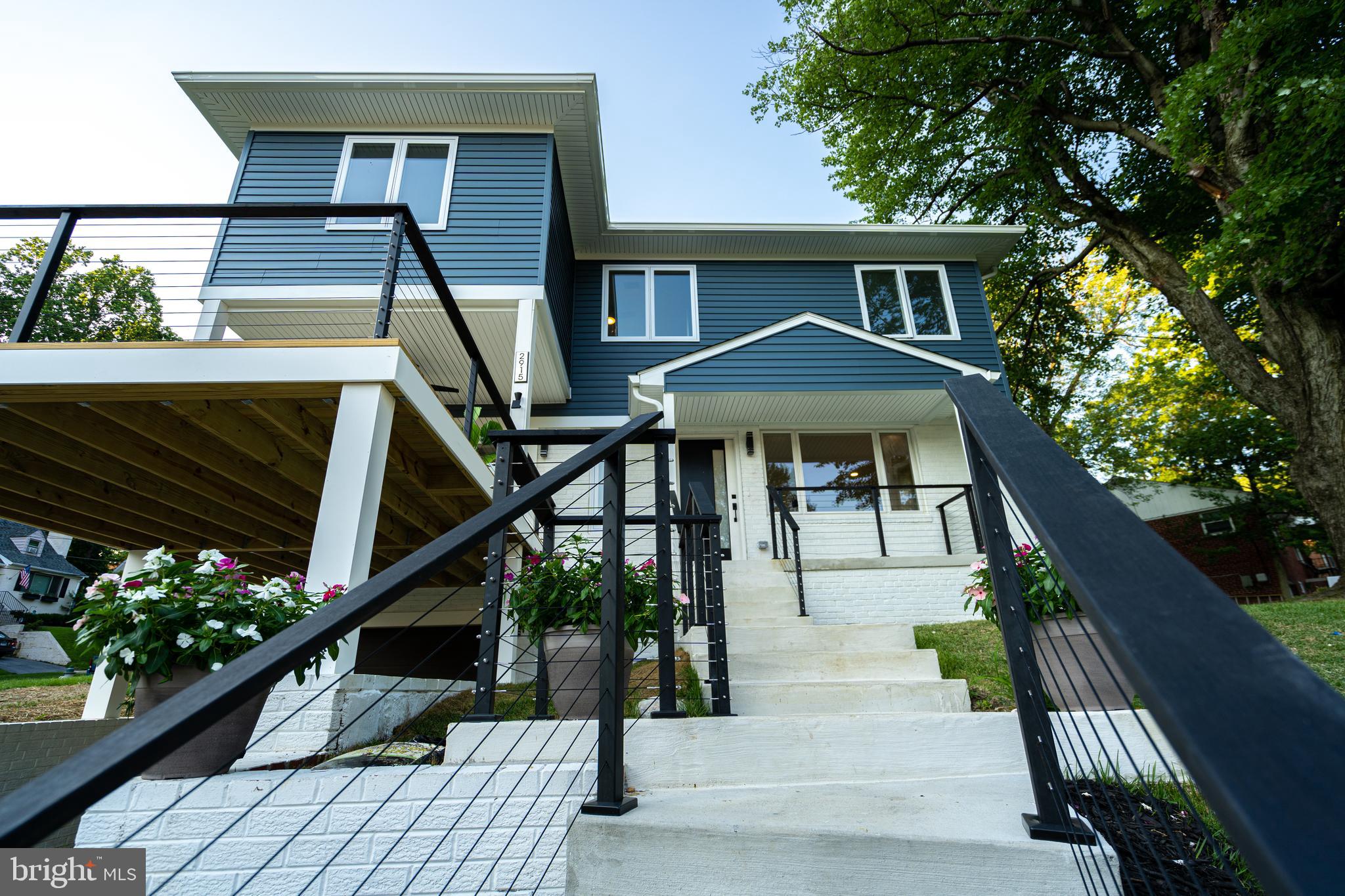 Check out the 3D Matterport View here: https://my.matterport.com/show/?m=K2dgHHfABoF @ Here is the virtual tour link https://bit.ly/2ZWf6gb @ This beautiful home features 4 bedrooms, 2 full and 2 half baths with a 1 car garage, a carport, and a total of 2,800 sq feet. As you step into your brand new home, you will love the contemporary open concept floor plan, 10 ft raised ceilings, plenty of natural light and trendy light fixtures throughout the home. The oversized, rare to find front balcony is perfect for entertaining your guests as it seamlessly flows from your kitchen and living room to the outside area. And if that's not enough, you will enjoy the double pergola in the backyard for extra entertainment space. Make all of your favorite dishes in style in your luxurious kitchen with its quartz countertops, stainless steel appliances, a farm sink, and a gas range. As you head upstairs, you'll notice the contemporary wire cable railing and recess lighting throughout the home. And when your day finally comes to an end, it's time to unwind in your beautiful master bedroom and bath that features a walk-in closet, double-sink vanities with a standalone tub and double showerheads. This home is also ideally located right next to downtown Kensington with plenty of shopping centers and restaurants! It's a commuters dream with Wheaton Metro Station just 3 minutes away! All in all, this is the perfect home, in the perfect location!