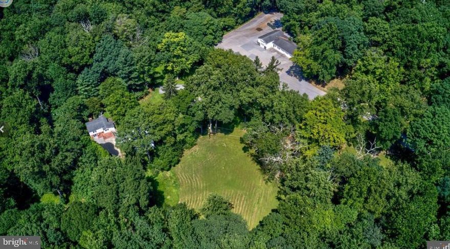 Build your private estate in the Valley.
It has been family owned and loved for the past seventy-four years. This unique opportunity offers over seven breathtaking secluded acres in Greenspring Valley, Stevenson. This is a potential for creating a spacious private estate ideally located minutes from the Beltway, Falls Rd, and I-83 in Baltimore County, offering both convenience and privacy. Driving through, you’ll arrive at a beautiful, flat area enhanced by stunning old-growth trees and lush shrubbery. Imagine your dream home on these pristine acres in 21153 Stevenson Perfect Greenspring Valley, where tranquility and elegance come together—a long, level possible gated entrance, emphasizing privacy and exclusivity. Upon arrival, you'll be greeted by magnificent views that change with the seasons, showcasing rolling hills and vibrant greenery. Imagine your home on this gentle slope of the land, which offers a stunning backdrop, making every sunrise and sunset a feast for the eyes.  Picture meandering walking paths throughout the property, leading to cozy nooks for quiet reflection or gatherings. The soothing sounds of the stream enhance the serene atmosphere, creating a perfect retreat from the hustle and bustle of everyday life. In addition to the beautiful land, the property features a farmhouse with updates from 1963, a small guest cottage office, and a partially finished lower level adjacent to a pool: a large barn/garage and a small gatehouse round out the property. Discover the potential of this unique property, which is ideal for your dream private estate!  All existing structures are as is. The existing structures and pool have been vacant for several years and need extensive renovation. The property is sold as a building lot for one exclusive private residence. 
You are invited to schedule an appointment with the listing agent before visiting the property.