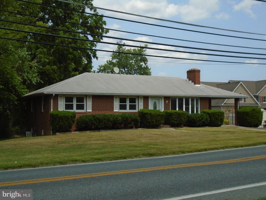 **NOTE** -- Public Records are incorrect.  Lot size is .60 acres.  There was a lot-line adjustment done in 2021.  Please refer to correct, updated PLAT in Documents located in this listing.

MAJOR PRICE ADJUSTMENT!!   
Located in a quiet and secluded area of Fullerton in Baltimore County, this property backs up to undeveloped  land owned by Baltimore City for the Fullerton Reservoir.  
This solid, brick 3-bedroom rancher is situated on .60 acres and offers one-floor living.  All 3 bedrooms are located on the main level.
House has been freshly painted,  has new vinyl plank flooring, and new wall-to-wall carpeting in the bedrooms.   The large living room has a bow window and a Buck wood stove in the fireplace.  Formal dining room has ceiling fan and new flooring.  Central air and gas heat.  Full, unfinished basement has outside entrance and brick fireplace.  The laundry area is in the basement, and the washer, dryer, and freezer are included in this sale.  There is a working toilet and shower in the basement.
Seller is offering a One-year warranty to Buyer at settlement.
Convenient to all amenities and transportation, I-695, I-95.
This property is easy to show.
Don't miss out on this property!!