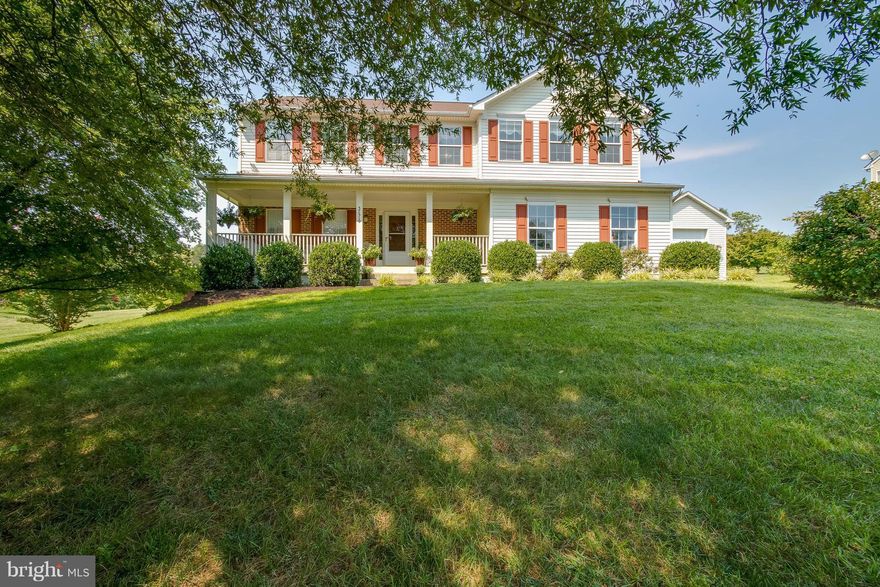 Stunning four bedroom, three and a half bath Colonial on over an acre with an additional two car detached garage. Master bedroom is oversized with a gorgeous master bath. Kitchen has been updated and expanded to include a new back patio with pergola. Family Room is huge, with a fireplace and beautiful views with a partially finished basement and walkout. Ready to move in. This home is a must see!