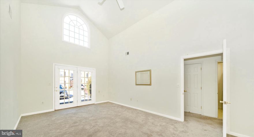 E-Z Living at it Best!  This Beautiful 2BD/2BA flat in sought after 55+ Winifred Manor has everything on one floor, no stairs, and is facing front parking lot for easy access.  This unit offers high living room ceilings with lots of natural light through the large windows and glass sliding door.  The adjoining dining area and kitchen are more than spacious and offer room for entertaining.  Both bedrooms are inviting with large windows, carpeted floors and good closet space. These rooms are on opposite sides of the unit and offer great privacy.  Come and see...  You'll love it!