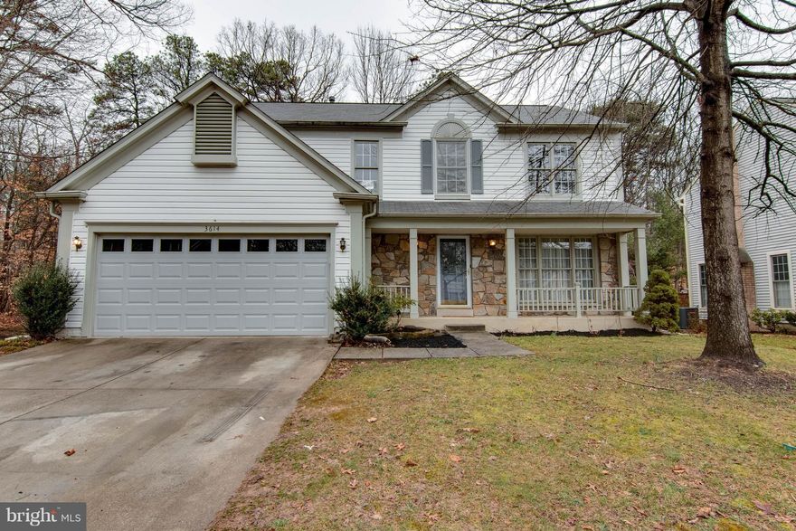 Updated, Upgraded and looking sharp! Fresh paint throughout - New engineered hardwood in foyer, living kitchen and upper level looks just great! Super kitchen with center island overlooking family room with fireplace! Lower level finished with space for workout area, game area and TV lounging! Nice deck off back overlooking private woods which will not be built on! Located at end w/ no thru street