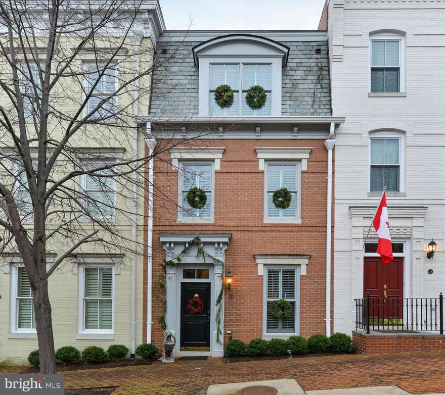 Sparkling 3 Bedroom 4.5 Bath townhouse with many custom features.  Hardwood floors throughout, high ceilings, 2 gas fireplaces, a sleek kitchen with neutral counters and backsplash and a LR built-in entertainment center plus bar area.  The luxurious master bedroom suite features custom wardrobe drawers, two walk-in closets and a marble bath with double vanities.  Exercise room and 2 car garage.