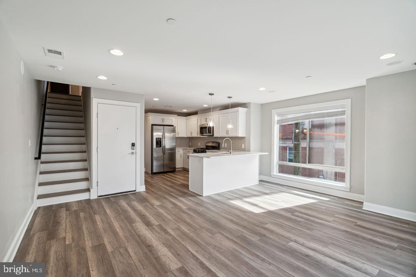 Welcome to 1419 Poplar St, a newly constructed triplex in the heart of Francisville. Whether you're a homeowner looking to ease mortgage costs or an investor eyeing a low-maintenance asset, this triplex is a golden opportunity. Capitalize on the remaining years of the tax abatement, ensuring substantial savings for savvy investors. This triplex offers two bi-level units, each boasting 3 spacious bedrooms and 2 bathrooms as well as one intimate 1 bed, 1 bath unit. All units feature hardwood floors throughout, large windows which drench the units in natural sunlight, open concept living/dining spaces and stunning kitchens with stainless steel appliances, quartz countertops, subway tile backsplash, and shaker cabinets. They each also have a dedicated laundry closet equipped with a washer and dryer. But that's not all – revel in the modern extras like a built-in surround sound speaker system, a smart thermostat, and a security system, adding a touch of luxury to your daily life. The top unit also showcases a wet bar where you can stop to grab a drink before heading to the private roof deck which offers unrivaled views of the Center City skyline, including the iconic William Penn. Located next to the Met, this triplex immerses you in the vibrant cultural scene of top-notch restaurants, bars, and entertainment options such as Divine Lorraine, Rybread, Bar Hygge and Vineyards Cafe, just to name a few! Walkable to Broad St for shopping and dining, and just two blocks from Girard Station for a seamless commute on the Broad Street Line.