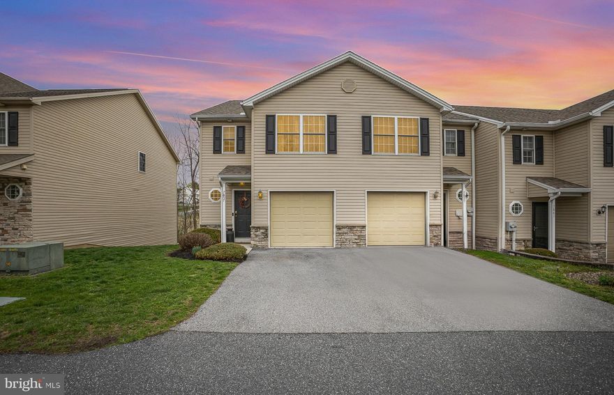Maintenance-free living is a breeze in this charming West Hanover Township home! Step inside to an open floor plan where the kitchen, featuring new appliances and a spacious breakfast bar, flows seamlessly into the bright living and dining area. Sliding doors lead to a private deck, perfect for relaxing while enjoying the wooded backdrop. Upstairs, the primary suite offers a walk-in closet and a private bath, while two additional bedrooms provide flexibility for guests, a home office, or more. Tile flooring adds durability to both full bathrooms, and a convenient first-floor laundry room makes daily tasks easier. The large walkout basement offers endless possibilities for future living space, and with a new HVAC system and roof, this home is move-in ready with major updates already completed. Don’t miss your chance—schedule a showing today!