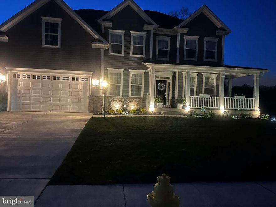 It's 2024 and your New Year Resolution should be a New Home; you DESERVE it, and we have the best deal in town!!  If you are looking for something new, but you don't want to be bothered with construction, uncertain settlement dates, etc... you can claim ownership of this stunning 2021-built home, bursting with endless and we mean endless options then WELCOME HOME to 6603 Timber Ridge Lane!
The home boasts a captivating wrap-around porch, inviting you to unwind and savor moments of serenity in the morning, at noon and at night.
 -As you enter you will be stepping into timeless sophistication with this meticulously crafted 5-bed, 2.5-bath residence. In the formal dining room, the tray ceilings add an elegant touch, creating a sophisticated atmosphere for gatherings. Meanwhile, the formal living room is bathed in natural sunlight, enhancing the warmth and inviting nature of the space. Together, they offer a harmonious blend of style and comfort, perfect for both formal occasions and casual relaxation.  
-Indulge your culinary senses in the gourmet kitchen of this, featuring upgraded quartz countertops, stainless steel appliance package, soft close cabinets, double wall oven, and so much more. Then there is the sunroom, where you can embrace the warmth of nature in the sunlit sanctuary.  Plan to experience the allure of 9-foot ceilings in the basement, a grand two-story living area, with a gas fireplace and natural sunlight galore.  The enchanting catwalk that elevates the home's architectural charm. Immerse yourself in contemporary luxury within this uniquely designed property – a true embodiment of modern living.
-The expansive primary bedroom is a luxurious haven, boasting a private sitting room that adds an extra layer of comfort and tranquility. The attached enormous bathroom is a spa-like retreat, featuring lavish amenities and upscale finishes. Completing this opulent suite is a master closet of grand proportions, providing ample space for indulgent wardrobe storage and organization. Together, they create a truly lavish and relaxing sanctuary.   In addition, there are three impressively spacious bedrooms, providing room for diverse design possibilities and individual comfort. The hall bathroom, equipped with double sinks, offers a blend of functionality and style, catering to the convenience and aesthetic preferences of a well-appointed home.
-The walk-out basement features a charming slate patio, seamlessly blending natural textures with the architectural landscape. The patio area offers a serene outdoor retreat, characterized by the earthy elegance of slate tiles, providing a perfect space for relaxation and gatherings. Plus, enjoy extra space on all levels with a 4-foot bump-out, adding a touch of spacious luxury to each floor. 
This residence seamlessly combines culinary excellence, outdoor charm, and expansive living spaces for an unparalleled living experience.