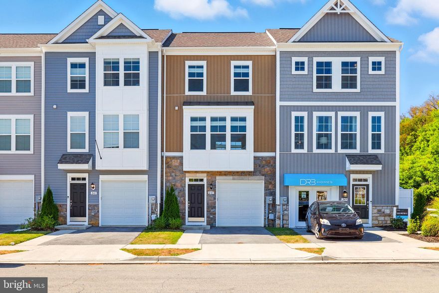 HUGE price reduction....this highly upgraded beauty is ready to GO!
Highly upgraded Bradford II townhouse in the charming Huntfield community. Hardwood stairs lead to the open-concept main level with gourmet kitchen—8’ island, quartz counters, upgraded cabinets, pantry, stainless appliances, and custom lighting. Dining room opens to Trex deck overlooking private yard. Bright living area, 3 bedrooms upstairs including a luxe owner’s suite with spa bath & walk-in closet. Lower-level rec room with half bath (easily full), walkout yard & garage. Minutes to shops, dining & commuter routes.