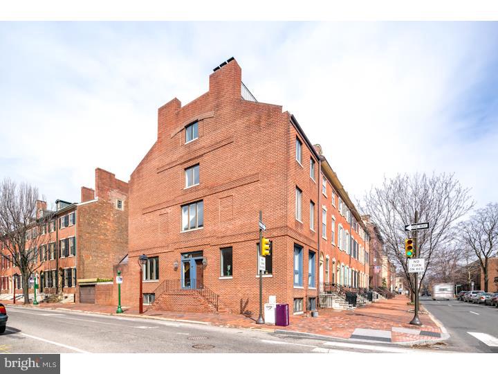 Grand four bed, 4.5 bath home, with parking and separate two bedroom pied- -terre apartment, located in the true heart of Society Hill. Situated prominently along Spruce Street with frontage on 3rd St this home embodies Historic Philadelphia sensibility while simultaneously offering a contemporary floor-plan and modern conveniences. Enter the spacious first floor level featuring open floor plan with high ceilings and an abundance of southern exposure light. This level offers large living room with wood burning fireplace, dining / socializing area, and gourmet Viking Kitchen with stainless, granite (your chef will be happy) and sit down counter with additional breakfast nook. Tucked away is also a convenient powder room. The kitchen area opens to rear patio and "garage parking" access area. Upstairs find the master suite with large bedroom, wood burning fireplace, walk through closet, and oversized master bath with sauna and large Jacuzzi tub. The third level features two additional bedrooms, both generous in size, each with it's own bathroom. The top level is an additional bedroom or office / den / gym with shower stall bathroom. This level also offers large laundry room and additional storage - and provides access to the roof - with stunning river and city views. The lower level of this home also offers a charming two bedroom one bath apartment with den - your guests have their own apartment, or use this unit for income (separate meters and entrance). Lower level apt: existing lease expires the end of Apr and then their renewal term is month to month with 60 days notice. The rent is $1500 per month. Main Unit rented to friend of owner for a nominal amount month to month. This generous home also offers hardwood floors and fresh paint throughout, central air, and DID WE MENTION OFF STREET PARKING? Please do not delay - schedule your visit soon.