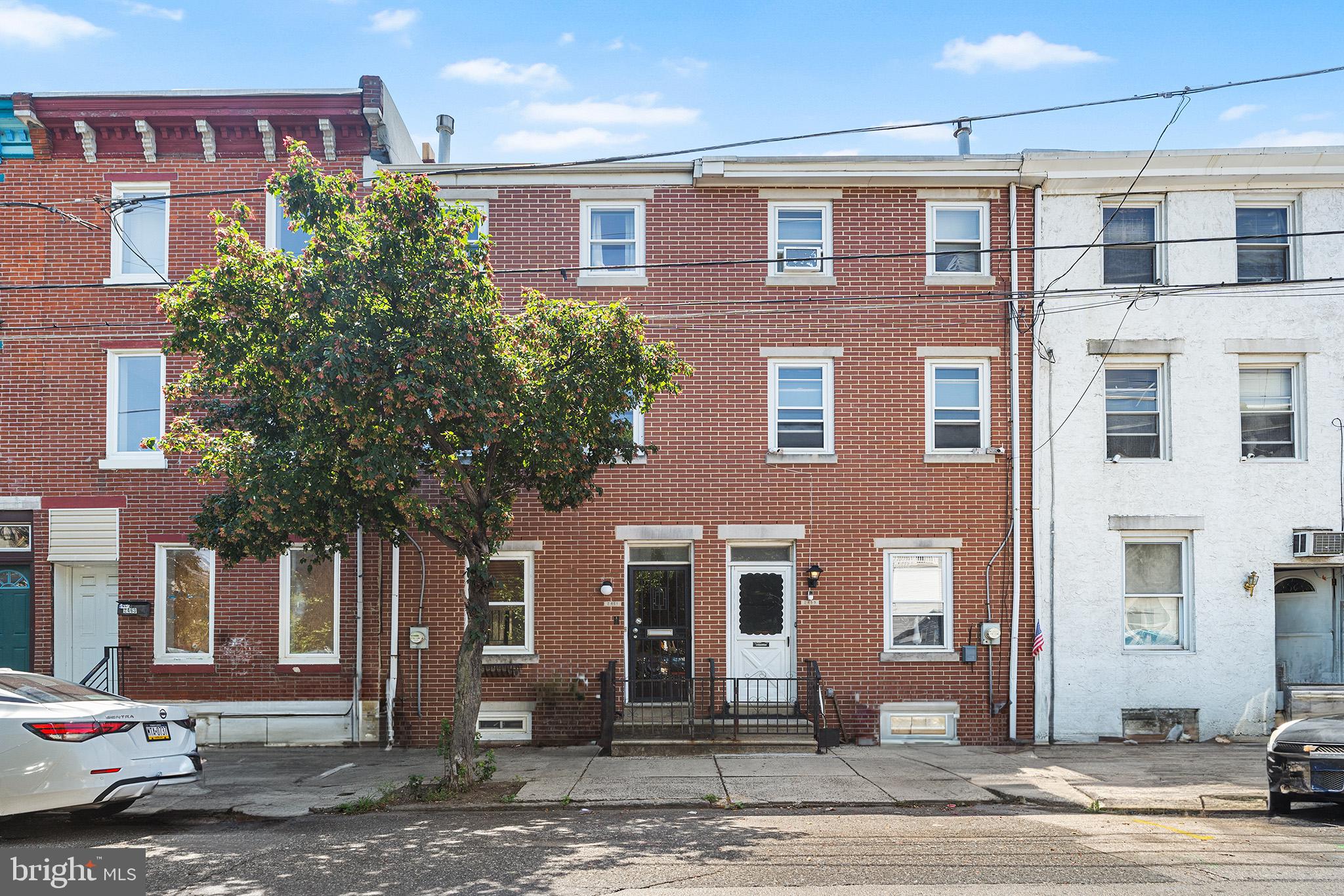 Have you been searching for that perfect blend of charm and modern functionality, just blocks from the buzzy Frankford Ave? Welcome to 2461 Amber Street - a lovingly maintained and delightfully unique 3-bedroom home with private gated parking, a secluded deck, and a freshly renovated kitchen. Step inside and you’re greeted by a classic center-stair layout that creates a cozy, distinct living space. The adjoining dining room is accented with built-in shelving and flows into a bright, thoughtfully redesigned kitchen featuring stainless steel appliances, a pantry, and crisp white cabinetry that maximizes style and storage. Out back, enjoy the best of both worlds: a gated garage door for secure on-site parking or a spacious garden and patio area perfect for summer dinners and weekend lounging. Upstairs, the second floor hosts a front-facing bedroom roomy enough for both a bed and a desk, plus a generous closet. Down the hall, you'll find a sunny full bathroom (tub/shower combo), convenient second-floor laundry, and access to the private deck. This outdoor escape features pedestal decking and a handmade mahogany door, overlooking a whimsical mural by Fishtown artist Keith Greiman - a lovely backdrop for your morning coffee or evening wine. The third floor offers two additional bedrooms, both with double closets and lots of natural light. And for the entertainer (or enthusiast), there’s a built-in kegerator with three tap lines ready for your beer, cider, or seltzer of choice. An unfinished basement provides ample storage. This home's location is unbeatable - just steps to Forin, Philadelphia Brewing Co., Picnic, Little Walter’s, and all the best of Fishtown, East Kensington, and beyond!