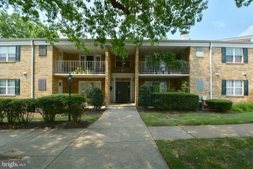 Large Falls Church City condo in one of the best-kept-secret condo developments.  Nicely renovated kitchen with granite counters, premium cabinets (Thomasville), high-end ceramic floors, new refrigerator, dishwasher, and sink.  High-end maple wood flooring, crown molding, brand new light fixtures, freshly painted throughout.  Main bedroom has new carpeting and 2 large closets.  2nd bedroom can be used as a den/study.  Updated bath & plumbing throughout unit. Private, quiet patio off living room with view of mature trees.  Close to many of Falls Church City’s attractions (restaurants, shopping, Farmer's Market, brand new library, State Theater), Mosaic District (Merrifield), I-66, 495 . Well known Falls Church City schools. Ample parking includes two guest permits.  Large storage room just outside the unit. Condo fee includes gas and water. Unit comes with 1 year home warranty.