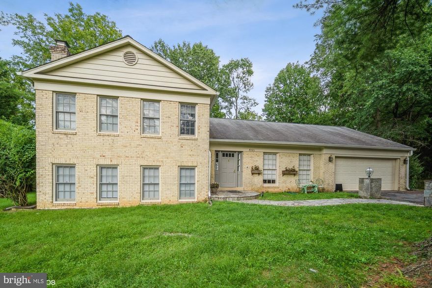 Incredible opportunity to purchase a single family home this close to the shops of Potomac Village for under 1M!  5BR/4BA split level w/ 2 car garage backing to trees on 15,585 SF lot.  Spacious entry foyer leads to a gracious living room, formal dining room to large addition on rear of home; boasts a great room w/ walls of windows & vaulted ceilings, which leads to main level master bedroom suite w/ sitting room w/ fireplace & separate entrance.  The total SF of home is much larger than what is indicated in the tax records w/ the main level addition; check out the floorplans with measurements in pictures & disclosure documents. Enter the spacious kitchen from the formal dining room or entry foyer; gas stove, built-in microwave, excellent cabinet space, penisula and large tablespace by the windows in kitchen w/ interior access to garage.   Enter the upper level from the entry foyer, which has 3BR/2BA, that incls another MBR suite w/ walk-in closet, hall bathroom has jacuzzi tub; hallway has 2 large linen closets; gorgeous hardwood floors on main & upper levels; new carpeting on stairs & lower level; sunlight beams throughout the home; lower level family room has big windows & fireplace w/ mantle;  5th bedroom w/ separate entrance, hall bathroom, & laundry/utility room complete the lower level; exterior & interior of home has been recently painted.  The home is situated on a large treed lot at the end of the pipestem, so it is very private & serene, easy turnaround in large driveway; a wonderful home in a prime location.  OPEN HOUSE SUNDAY, 9/12, 1:00-4:00 PM, NOT TO MISS!