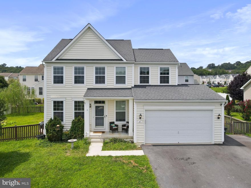 Charming Colonial Home in Stonebrook Village
Great location conveniently situated close to schools and the town of Hedgesville.
The main level offers an open family room and kitchen, seamlessly connecting to a beautiful, spacious enclosed porch and large fenced yard. Additionally, there is a private office space for work or study.
Upstairs; there are four bedrooms and two full bathrooms. The laundry room is conveniently located on this level for added ease.
The finished lower level includes a family room, a fifth bedroom, an office, a bathroom, and a versatile multi-purpose room perfect for crafts or various projects.