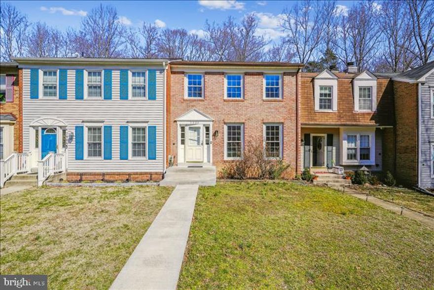 Immaculate & Move-In Ready! This exceptional three-level brick townhome is a rare gem. Featuring three spacious bedrooms and four updated bathrooms, it offers over 1,900 square feet of finished living space. BRAND NEW CARPET AND FRESH PAINT. Enjoy separate living and dining rooms, plus an eat-in kitchen. WHITE CABINETS AND GRANITE COUNTER TOPS. Beautiful sidewalk and expanded front porch enhance its curb appeal. The finished lower level boasts laminate flooring, a cozy fireplace, and direct access to an expansive entertainment deck, yard, storage shed, and a serene wooded backdrop. A half bath and a laundry area with a full-size washer and dryer complete this level. Agents: Schedule via Showtime, then Go & Show—Vacant and ready for viewing!