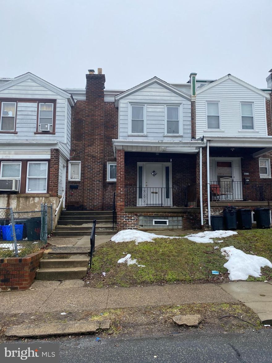 Great  starter home or investment rental with potential return of appx.  10% .   Desirable Holmesburg section close to public transportation , minutes from I 95 at Academy Rd Exit .   Charter school   walking distance .    Front lawn , front covered porch . Formal living room with carpets , formal dining room with new vinyl flooring , sliders out to rear deck .  Large kitchen with new vinyl flooring and eating area . ( range will be installed prior to settlement ) . Full basement ( garage was converted and closed for additional living space ) , laundry area , heating area .  Lots of potential to finish and add another 500-600 sq ft of  ground level living space .  2nd floor has 3 regular bedrooms with hardwood floors .  Hall bath with skylight .  Quick settlement is ok !!  Seller wants a quick and easy deal !  Well priced for area and low inventory !!